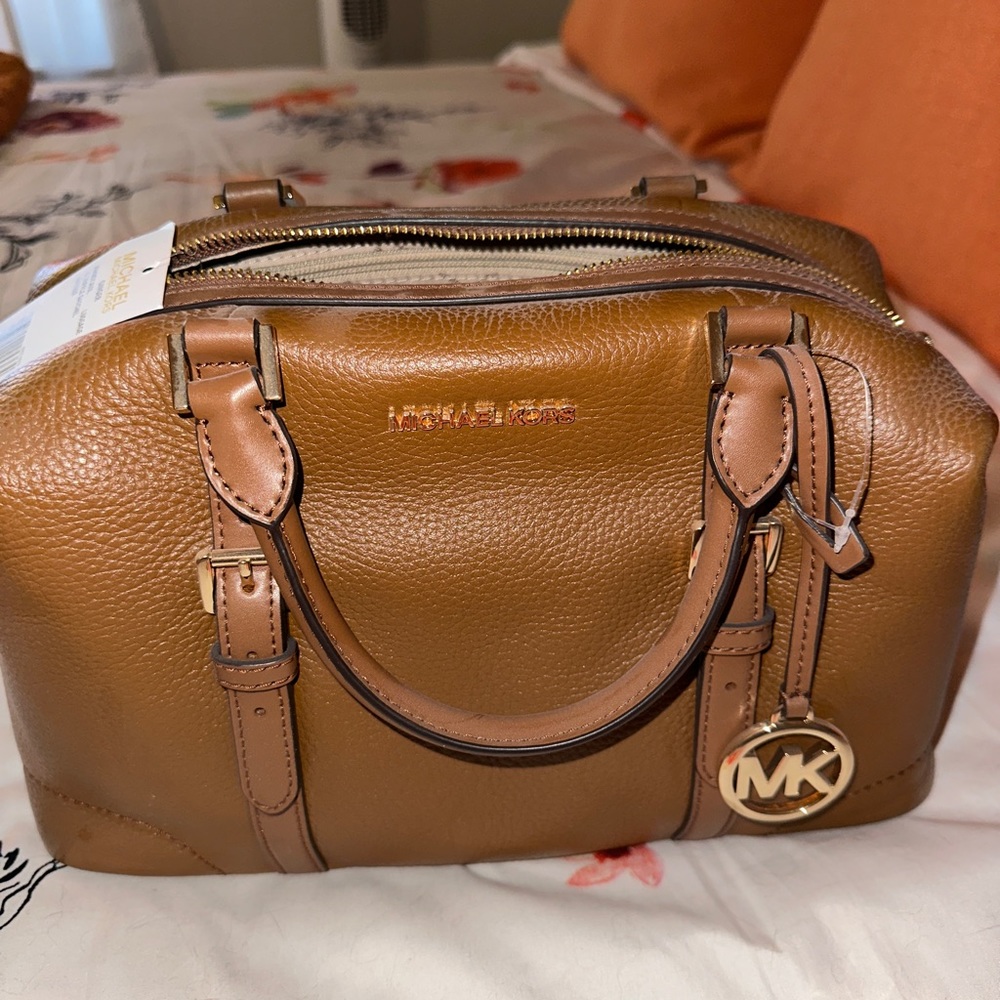 Brand new, never used with tags.